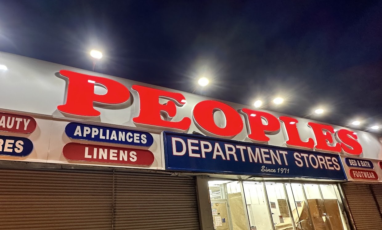 Peoples Department Stores illuminated storefront sign