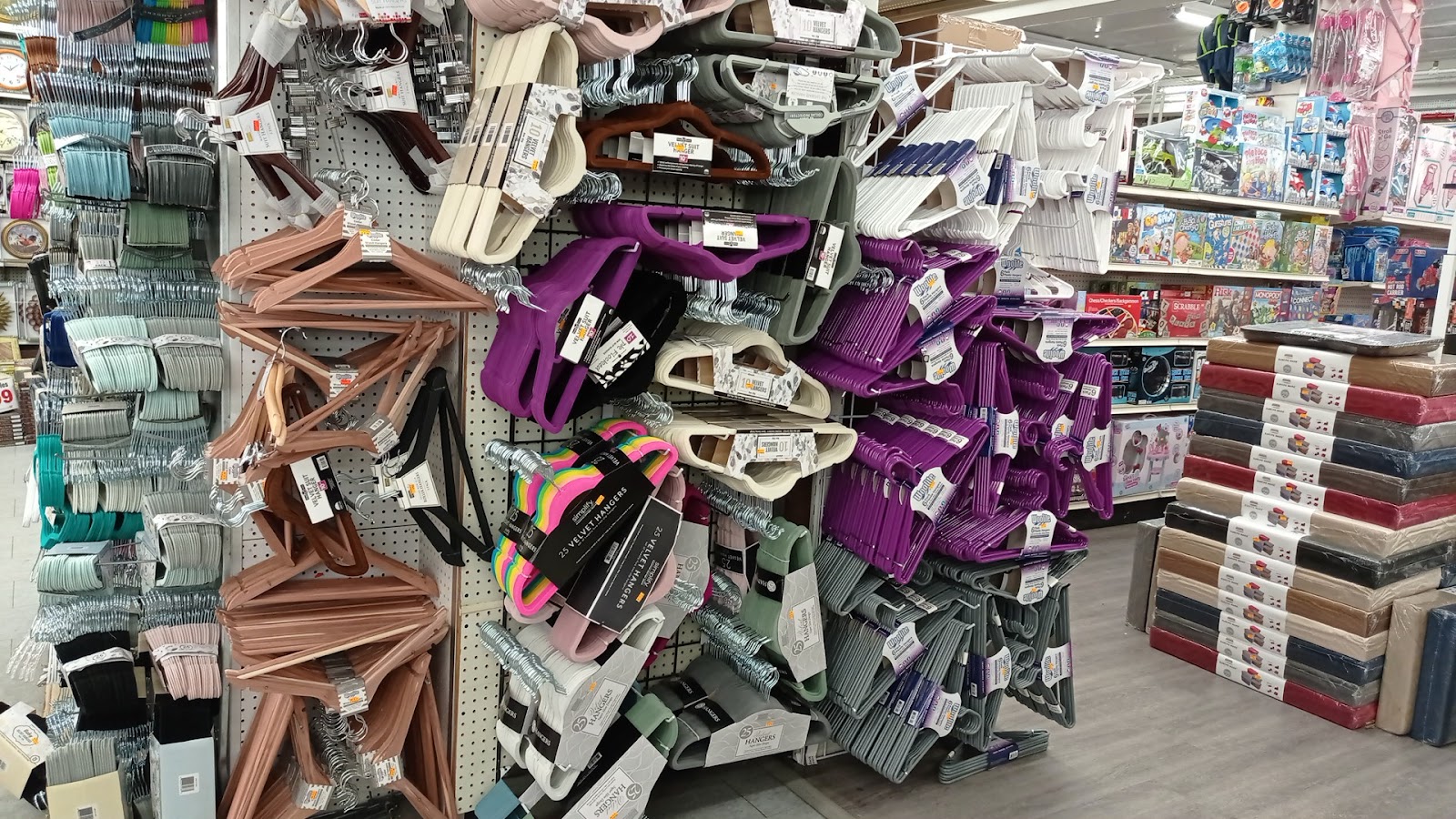 Hangers, sheet sets and home goods on display at Peoples Department Store