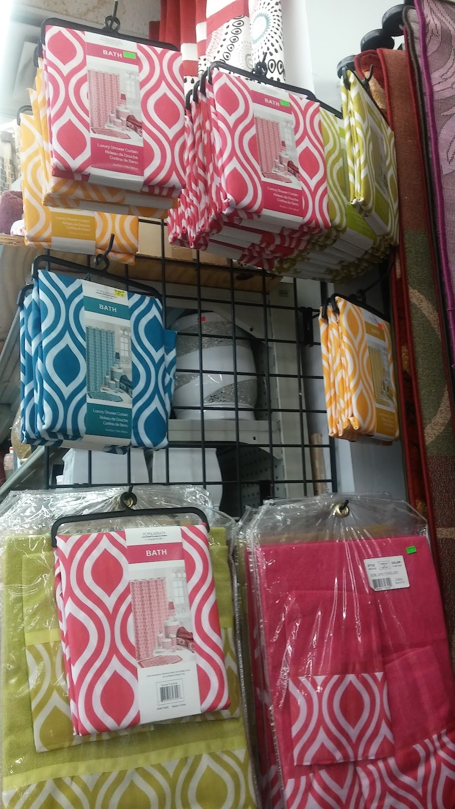 Shower curtains hanging on display at Peoples Department Store