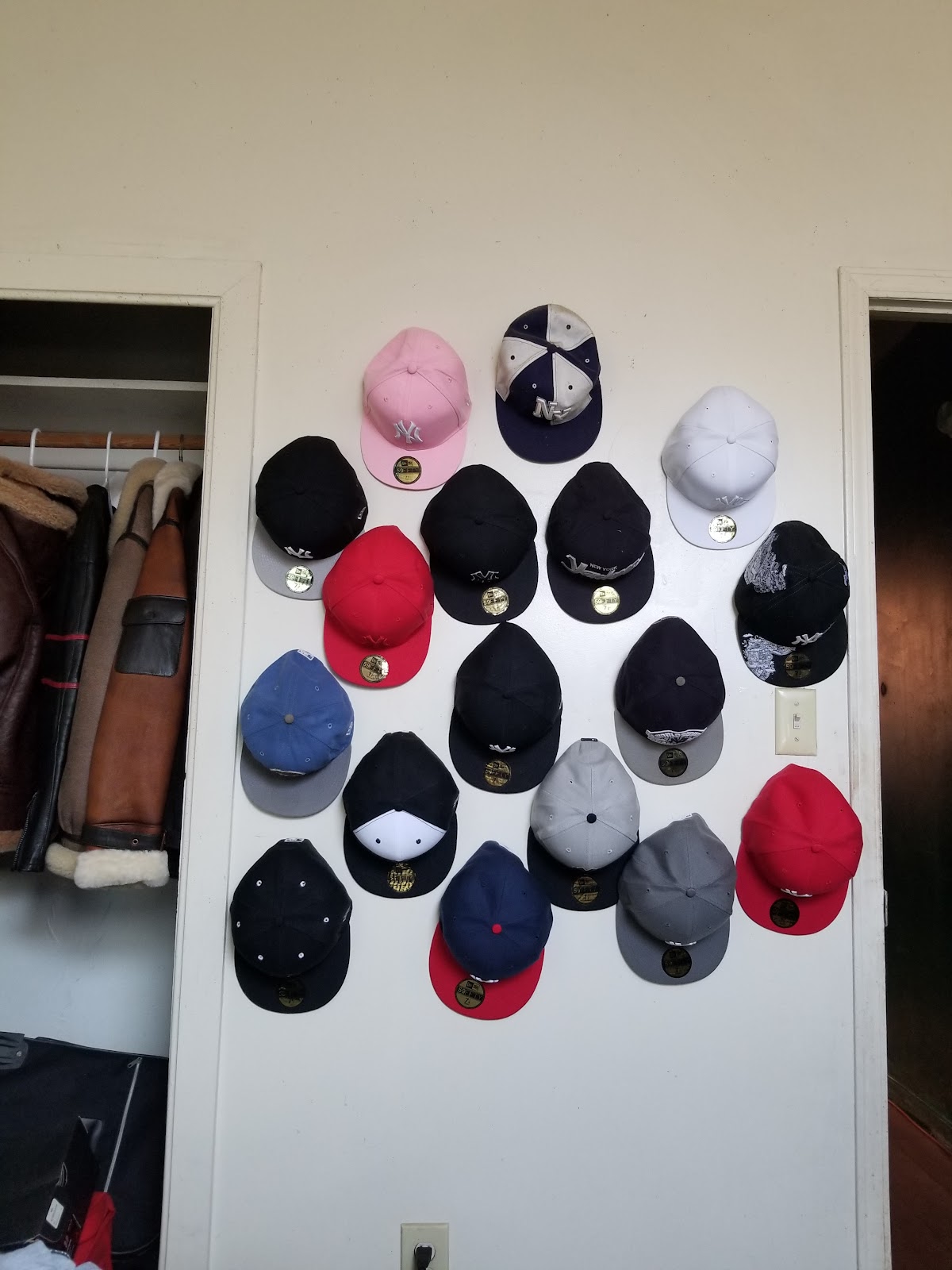 Caps displayed on the accessories wall at Peoples Department Store