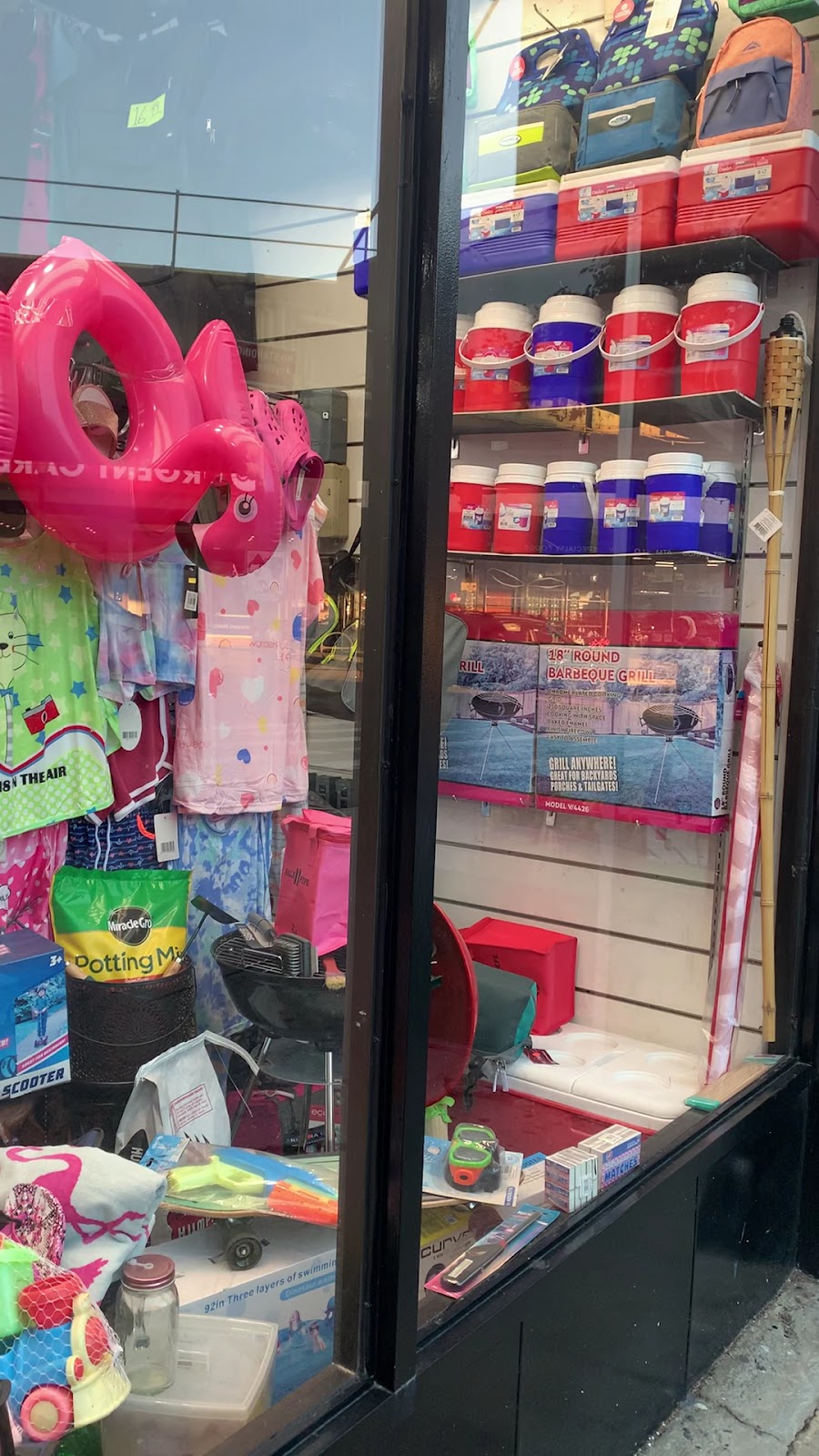 Window display of children's sleepwear and plush toys at Peoples Department Store