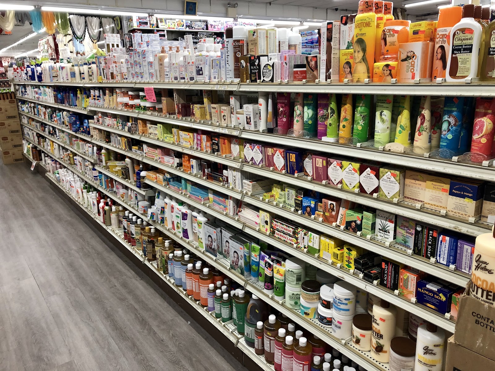 Hair care and personal care aisle at Peoples Department Store